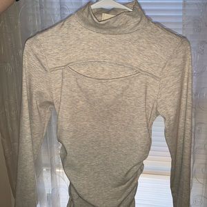 Cream Turtleneck With Open Neckline